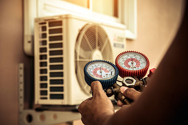 Professional Ac Installation technician working in Grafton, ND